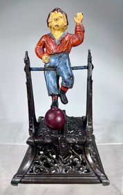 Boy on Trapeze Cast Iron Mechanical Bank