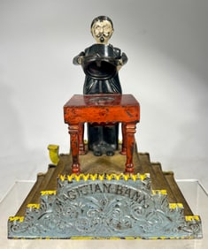 Magician Cast Iron Mechanical Bank