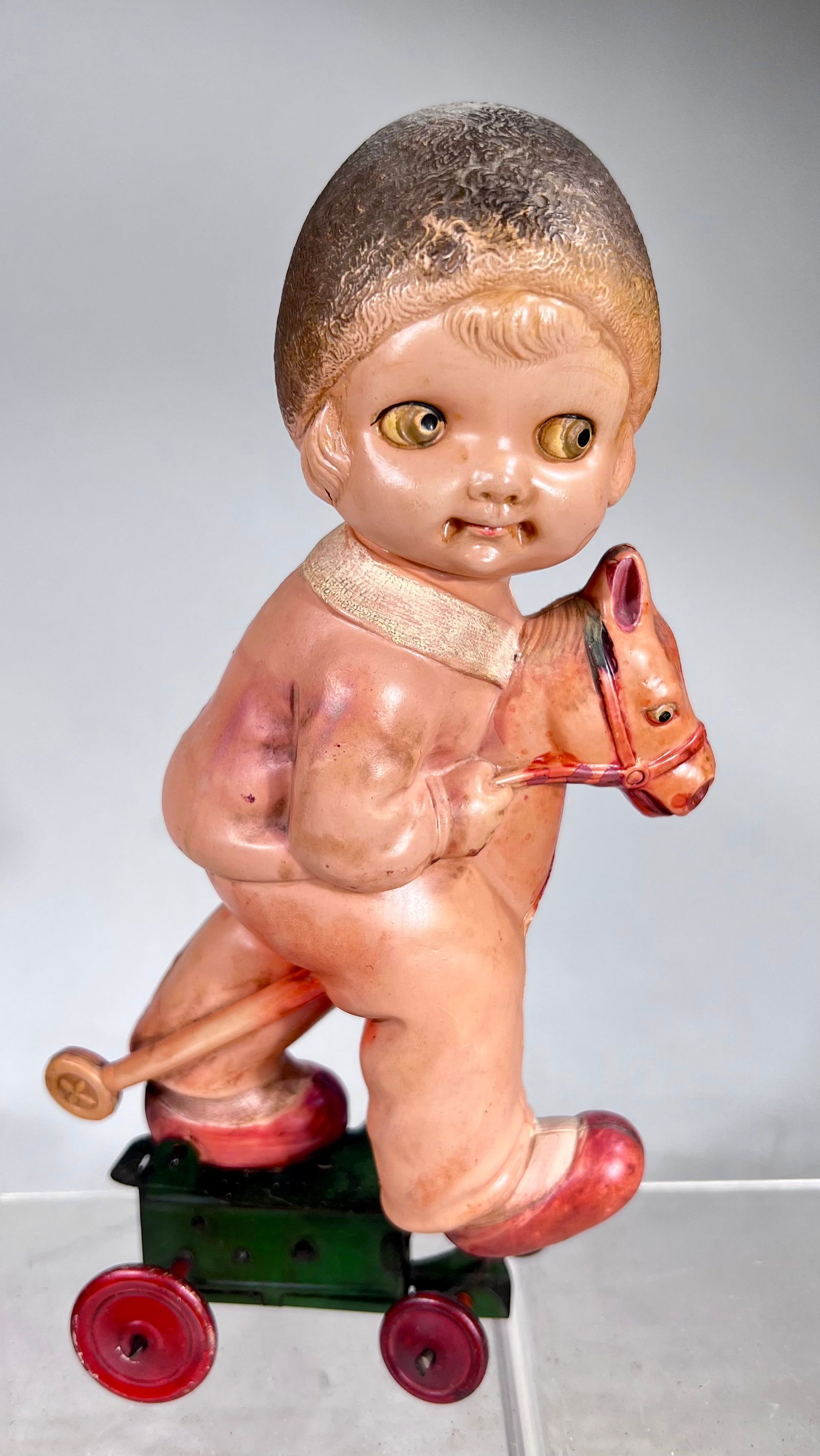 Celluloid Girl Riding a Hobby Horse Windup Toy: Japanese 1930s - 9 ¼” T x 4 ½” x 3” D