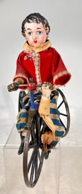 Young Boy Riding a Velocipede