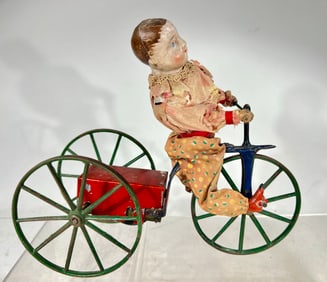 Young Man on Tricycle Clockwork Toy