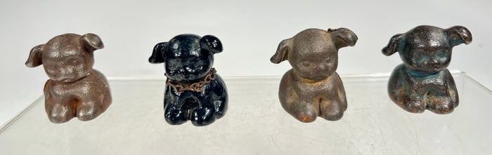 Four Puppo Paperweights