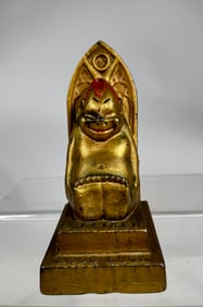 Billiken on Throne