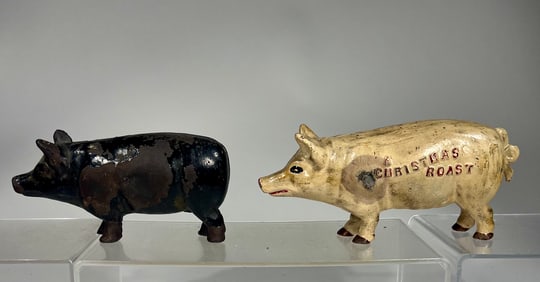 Two Cast Iron Pig Banks