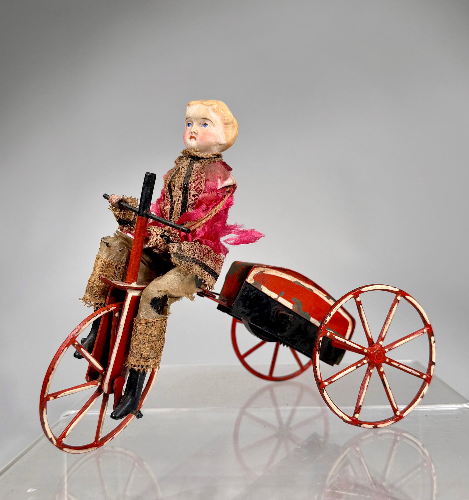 Girl on Tricycle Windup Toy: French 1880s - 7” T x 8 ½” L x 4” ½” D