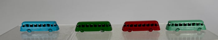 Four Diecast Buses
