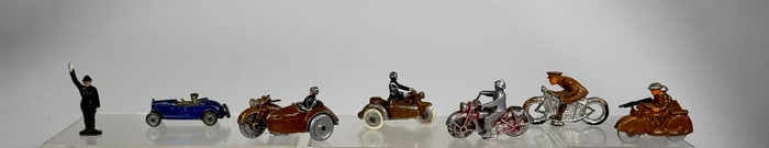 Dimestore Motorcycle Lot (7) - Five Motorcycles / Policeman