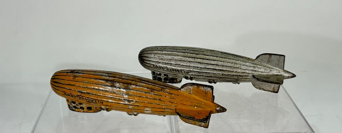 Two Zeppelin Toys Banks