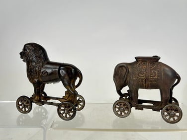 Two Animal Banks on Wheels