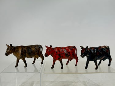 Three Cow Cast Iron Banks