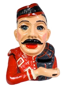 Kiltie Bank with Original Cardboard Box - Cast Iron Mechanical Bank