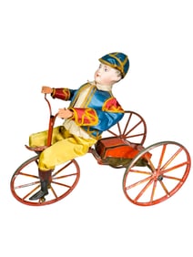 Fanciful Dressed Young Man Riding a Tricycle - Wind Up Toy