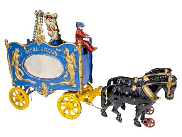 Royal Circus Mirror Van with a Revolving Acrobat - Cast Iron Toy