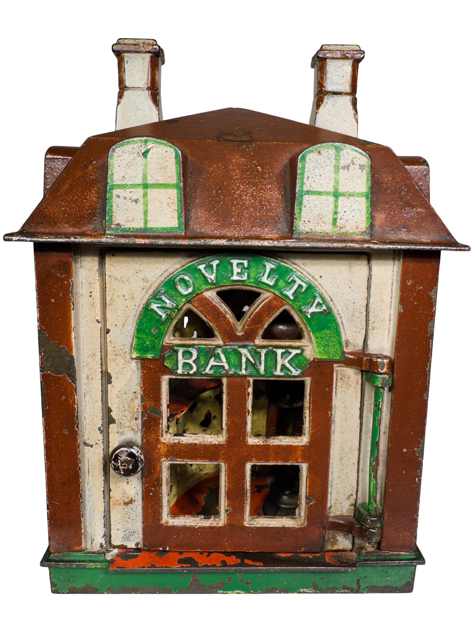 Novelty Cast Iron Mechanical Bank: Brown and Tan Paint. J. & E. Stevens Company. Cromwell, CT. 1870's. 7" Tall x 5" Wide x 4 1/2" Deep.
