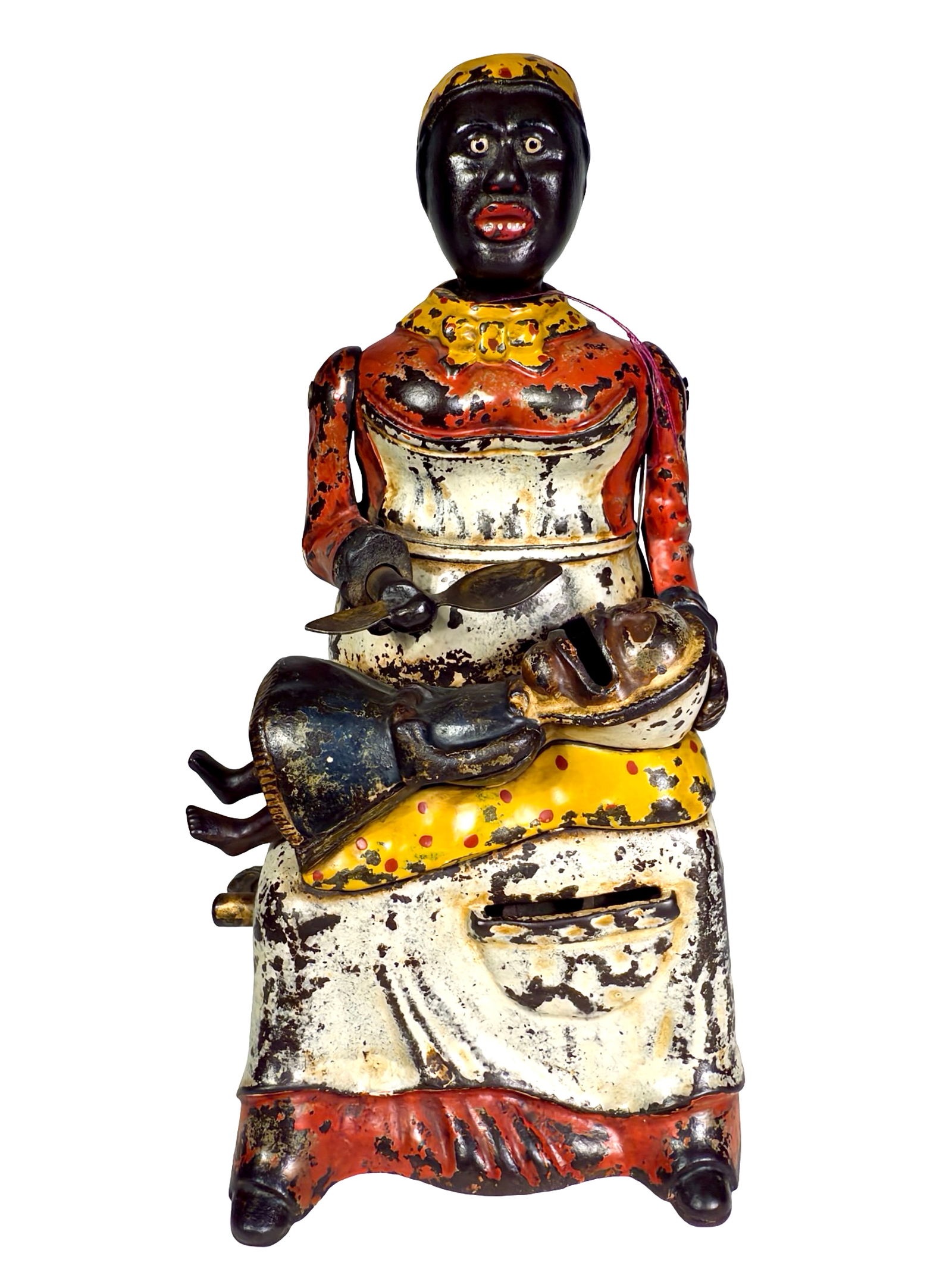 Mammy and Child Cast Iron Mechanical Bank: Red Dress Version. Kyser and Rex Company. Philadelphia 1890's. 7 1/2" Tall x 3 1/3" Wide x 4" Deep.