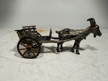 Cast Iron Road Cart Pulled by a Goat