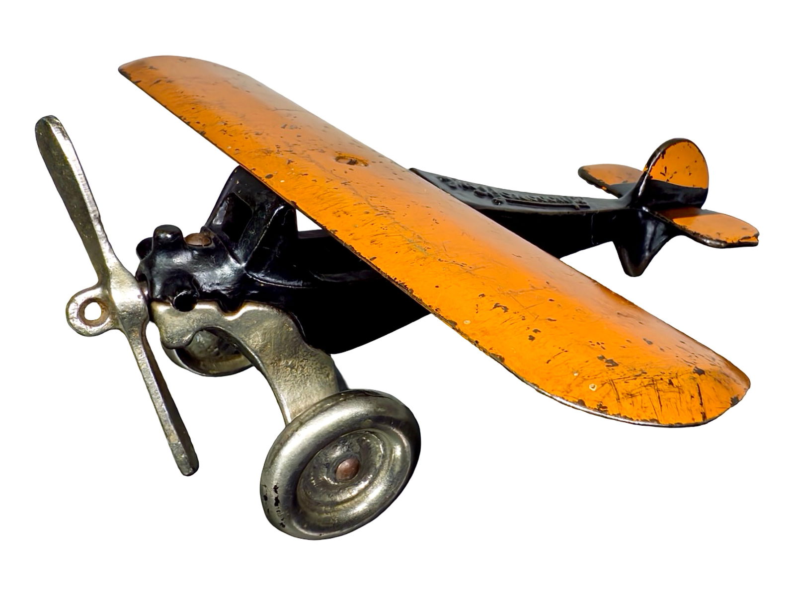 Cast Iron Monoplane: Arcade Mfg. Company. Freeport, IL. 1930's. 4" Tall x 8" Wingspan x 8" Long.