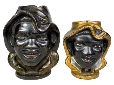 Large and Small Cast Iron Two Faced Young Boy Banks