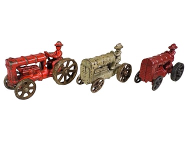 Three Cast Iron Tractors