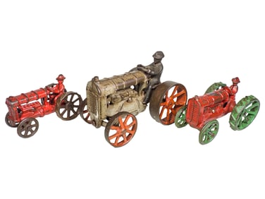 Three Cast Iron Tractors