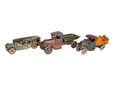 Three Cast Iron Trucks