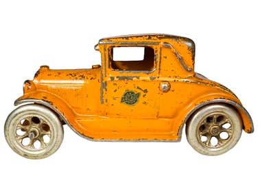 Orange Cast Iron Coupe Toy