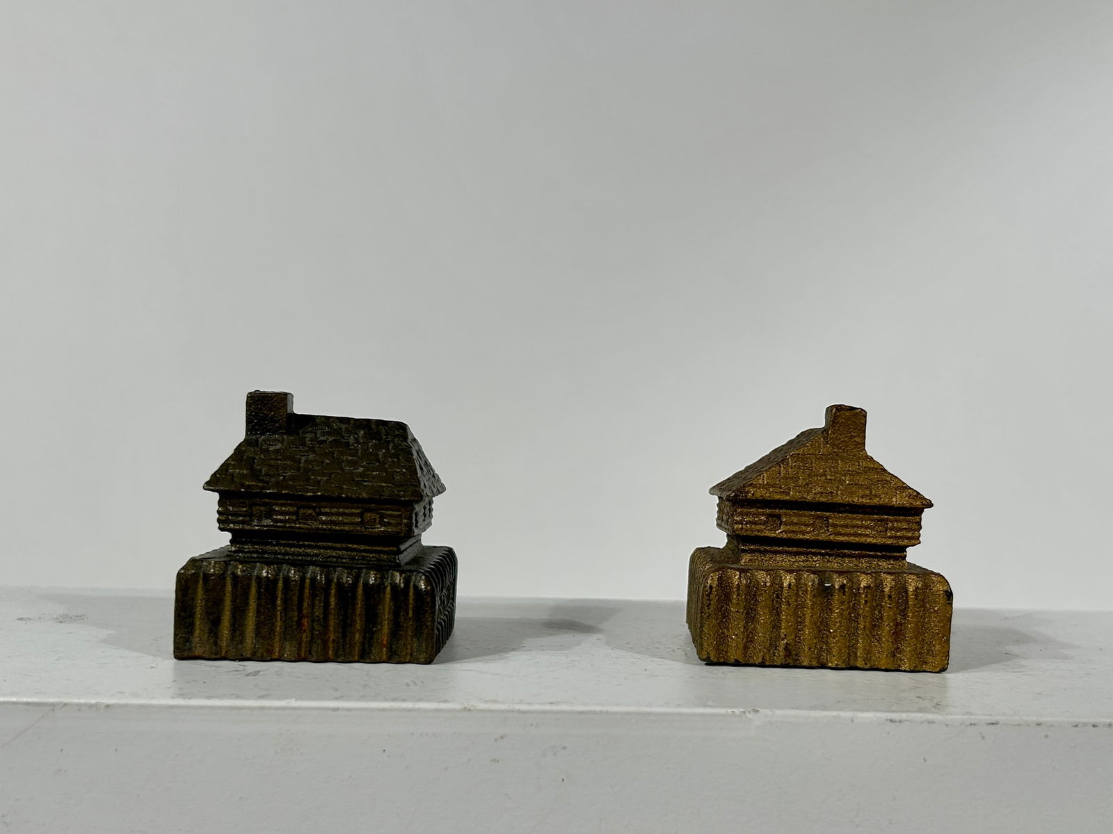 Two Cast Iron Paperweights for Fort Snelling: American 1920's - 2"T x 2"W x 2"D