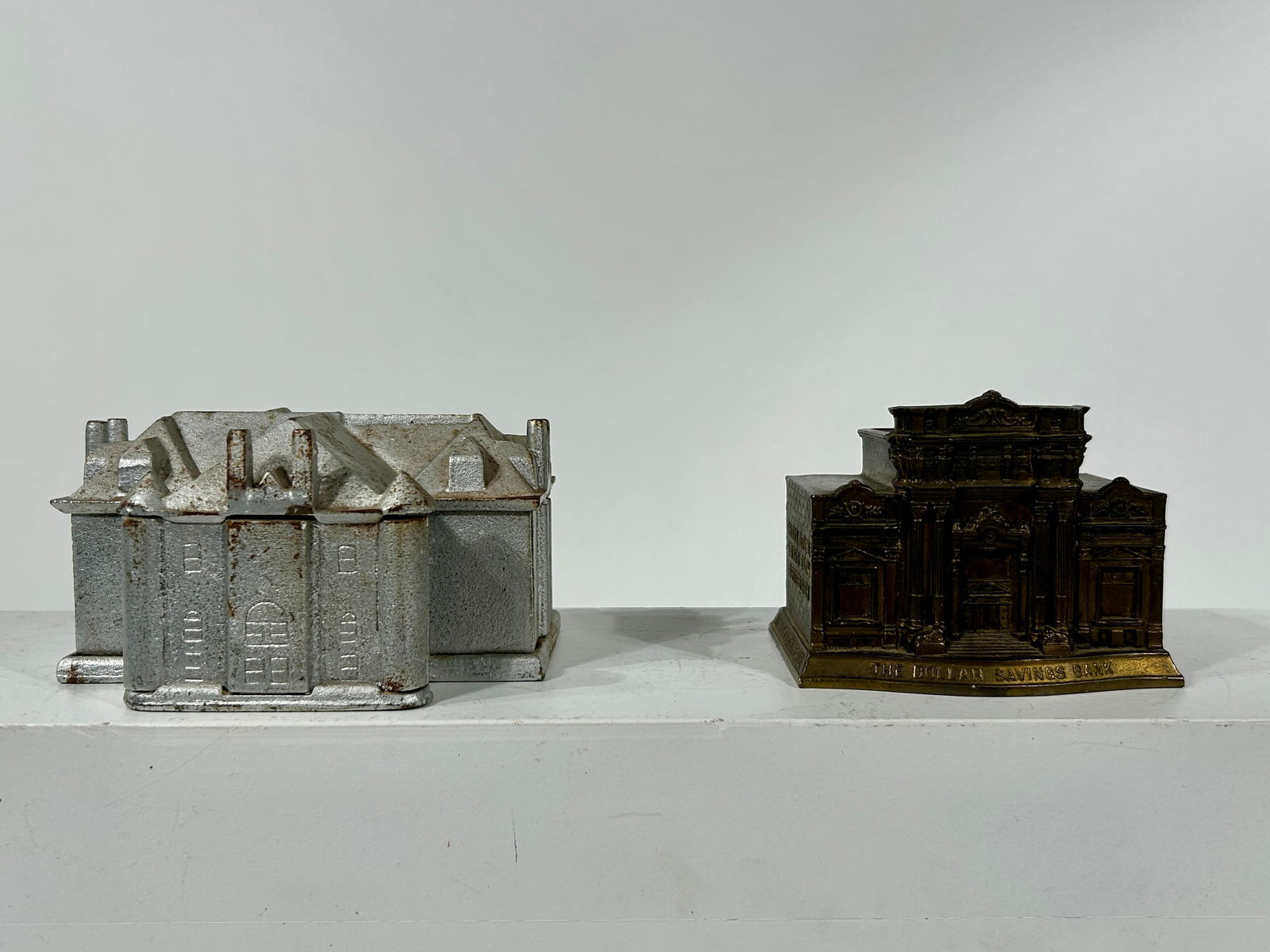 Lot of Two Building Banks - Bethel College Library and Dollar Savings Bank: A.C. Rehberger / Service Foundry - American 1930's/1950's - Longer One is 5 1/4"