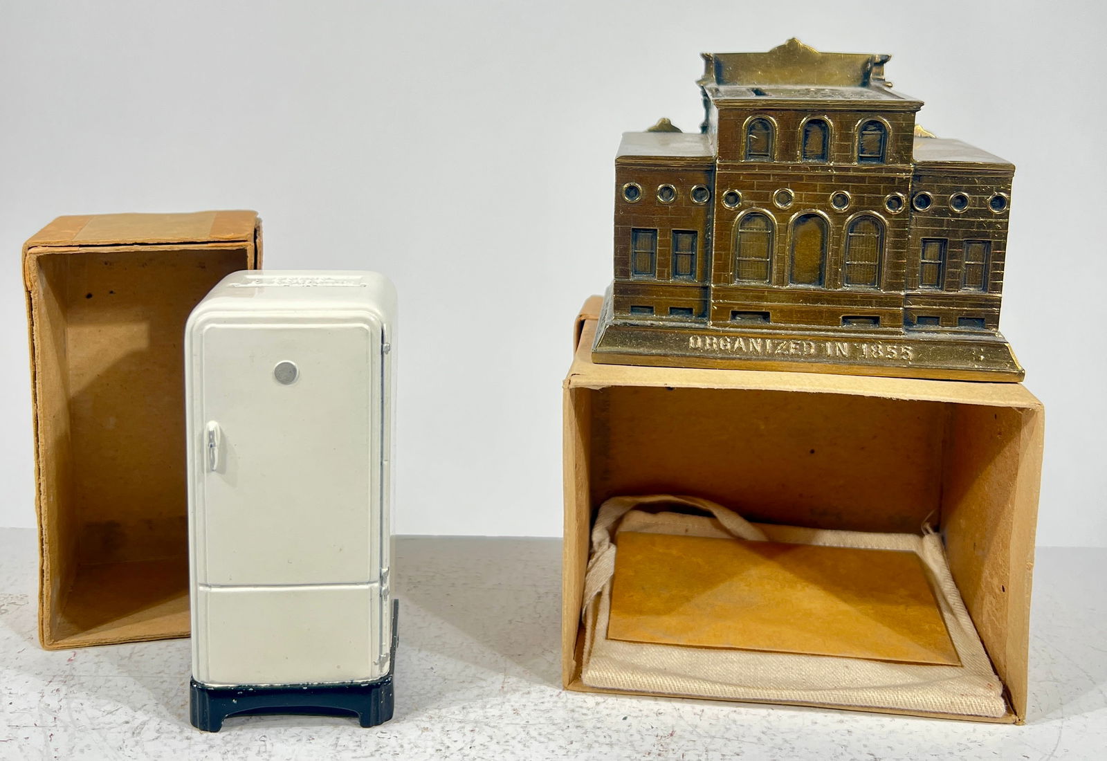Two Still Banks with Original Boxes - Electrolux Fridge and Dollar Savings Bank: American 1930/40's - Building is 4"L x 3"T x 2 3/4"D