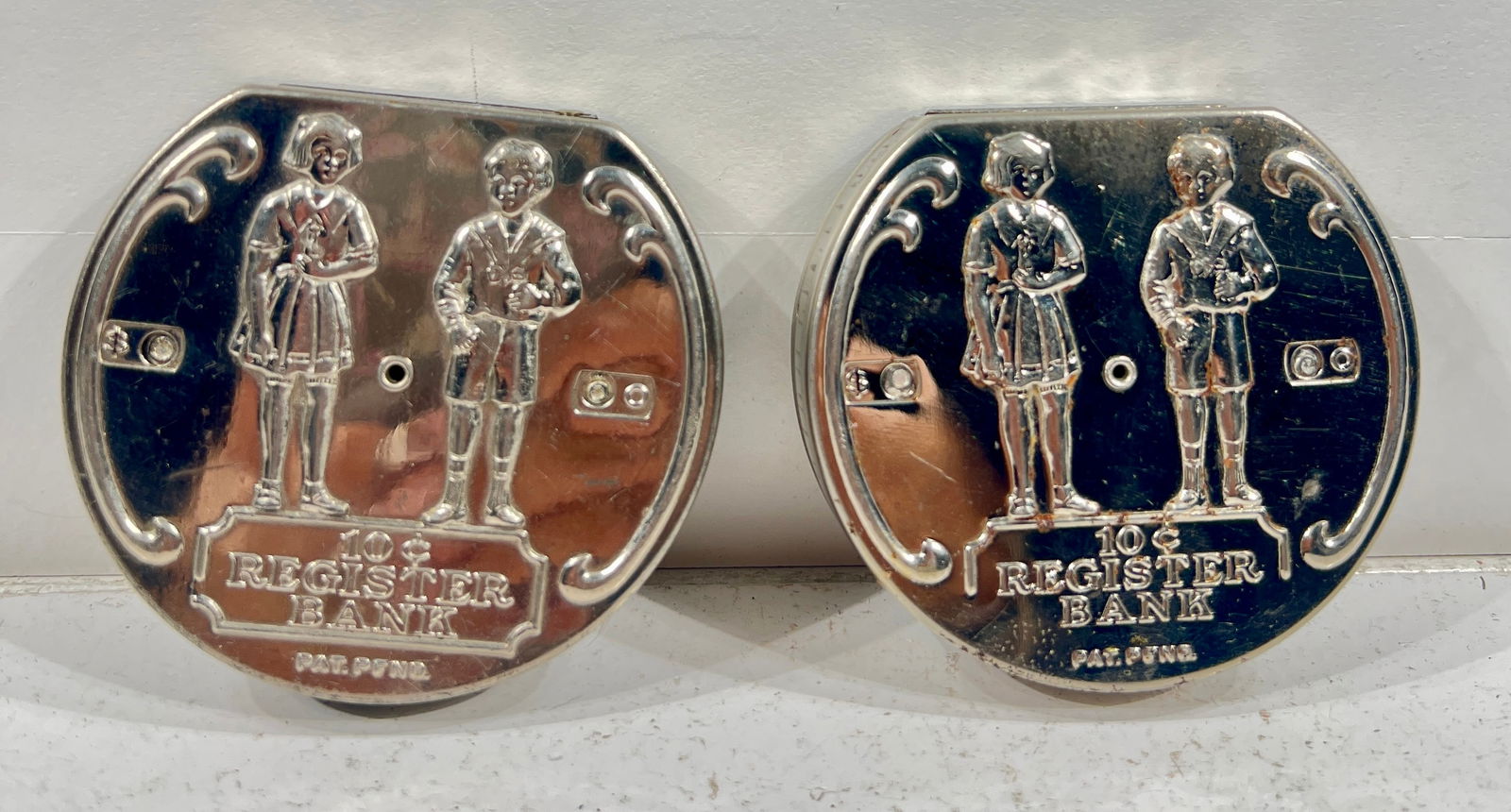 Two Boy and Girl Tin Dime Register Banks - Scarce Partial Box and Full Box (1 of 2)