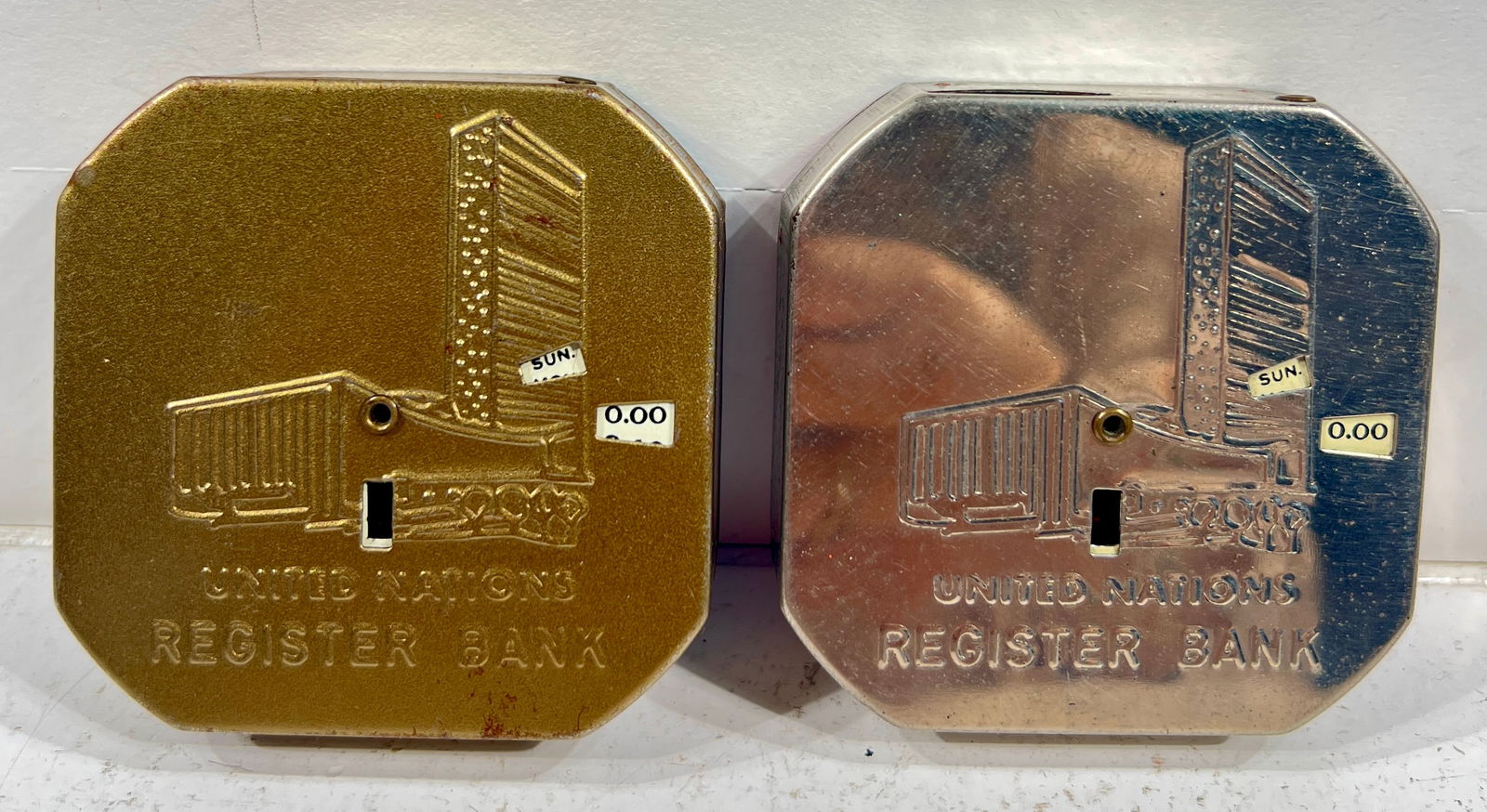 United Nations Tin Dime Register Banks - Silver and Gold Versions (1 of 2)