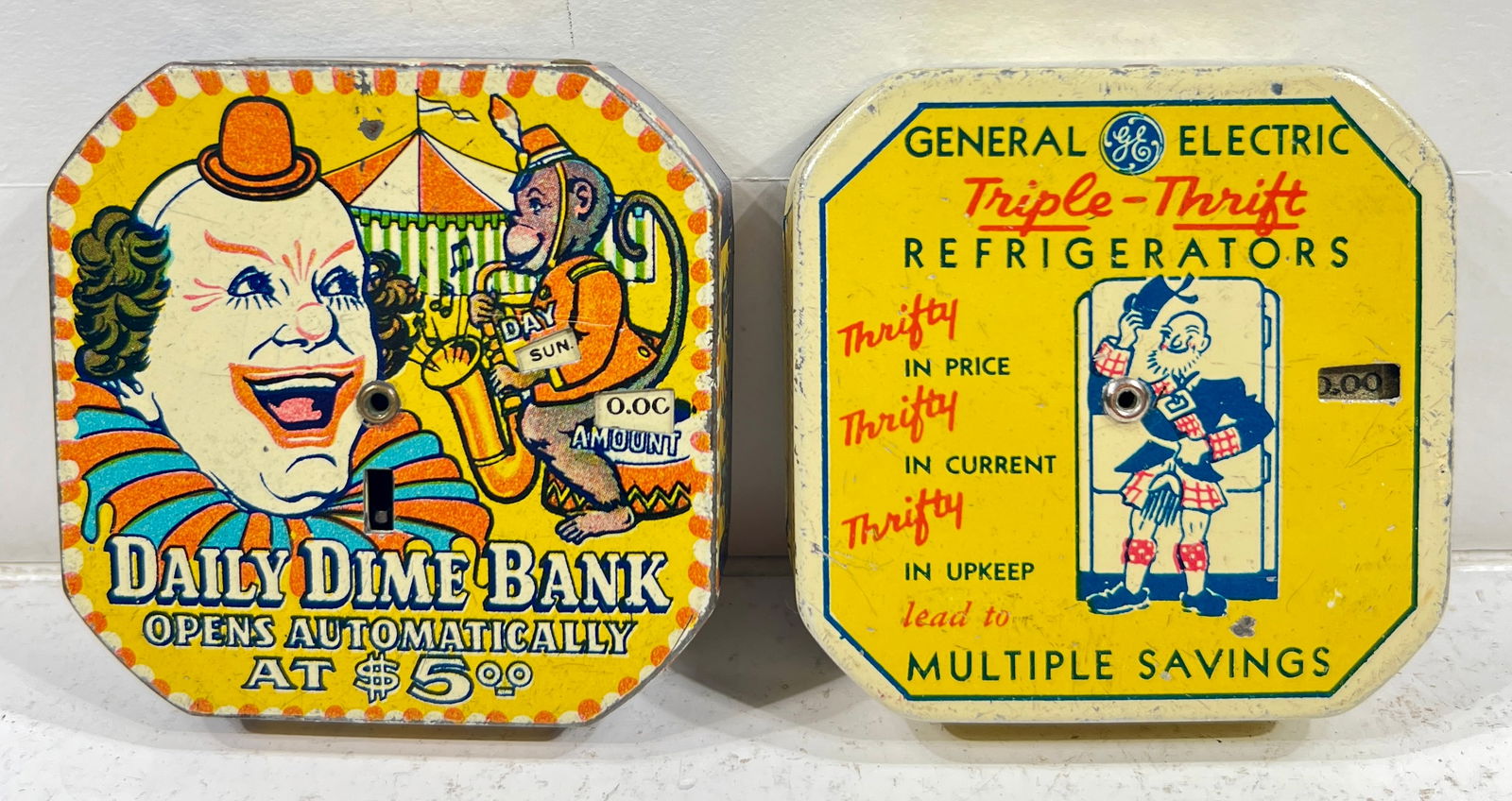 General Electric and Clown with Red Hat - Tin Dime Register Banks (1 of 2)
