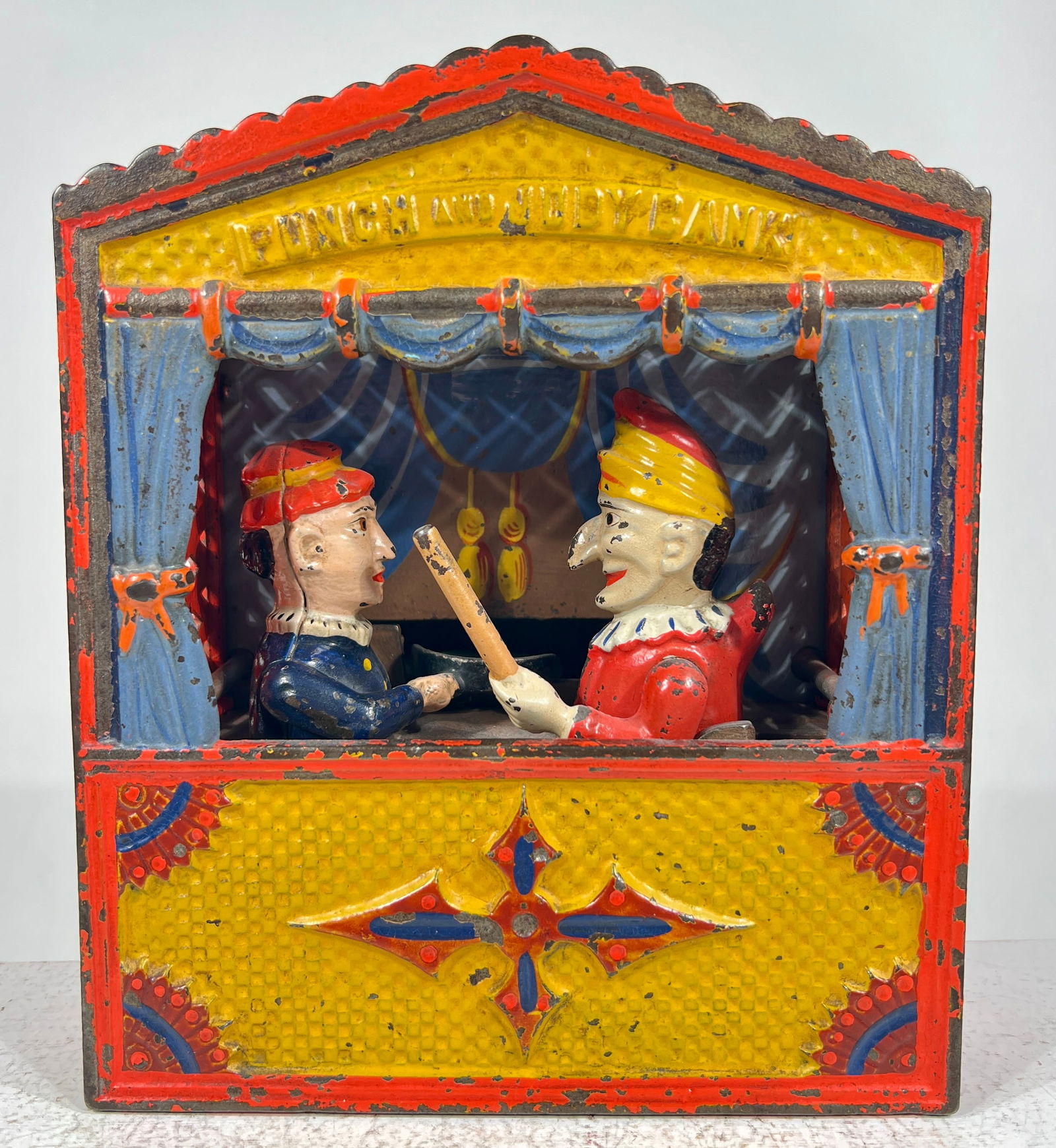 Punch and Judy Cast Iron Mechanical Bank - Small Letter Version: Shepard Hardware Co. - Buffalo, NY. 1890 - 7 1/4"T x 6"W x 3 3/4"D