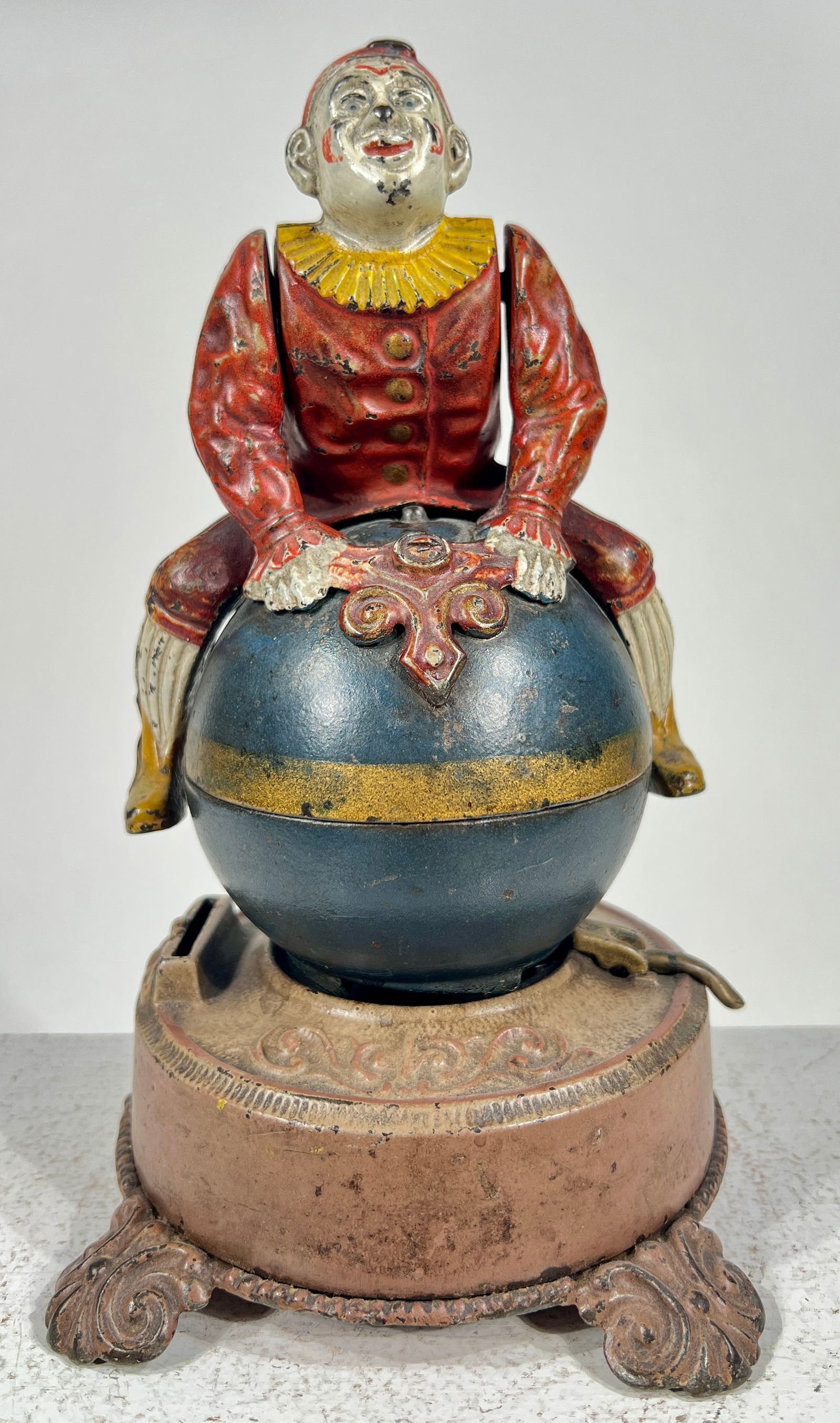 Clown on Globe Cast Iron Mechanical Bank - Tan Base Version: J & E Stevens Co. - Cromwell, CT. 1890 - 8 3/4"T x 6 1/2"Circular Base