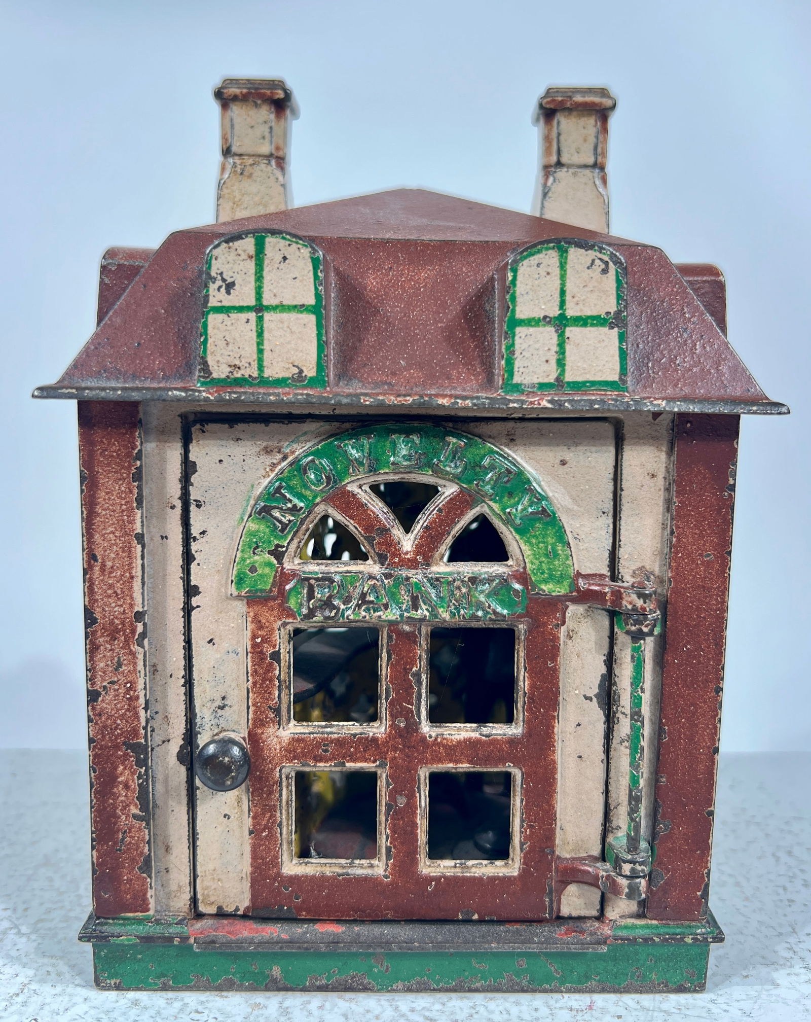 Novelty Cast Iron Mechanical Bank - Tan, Brown, and Green Version (1 of 3)