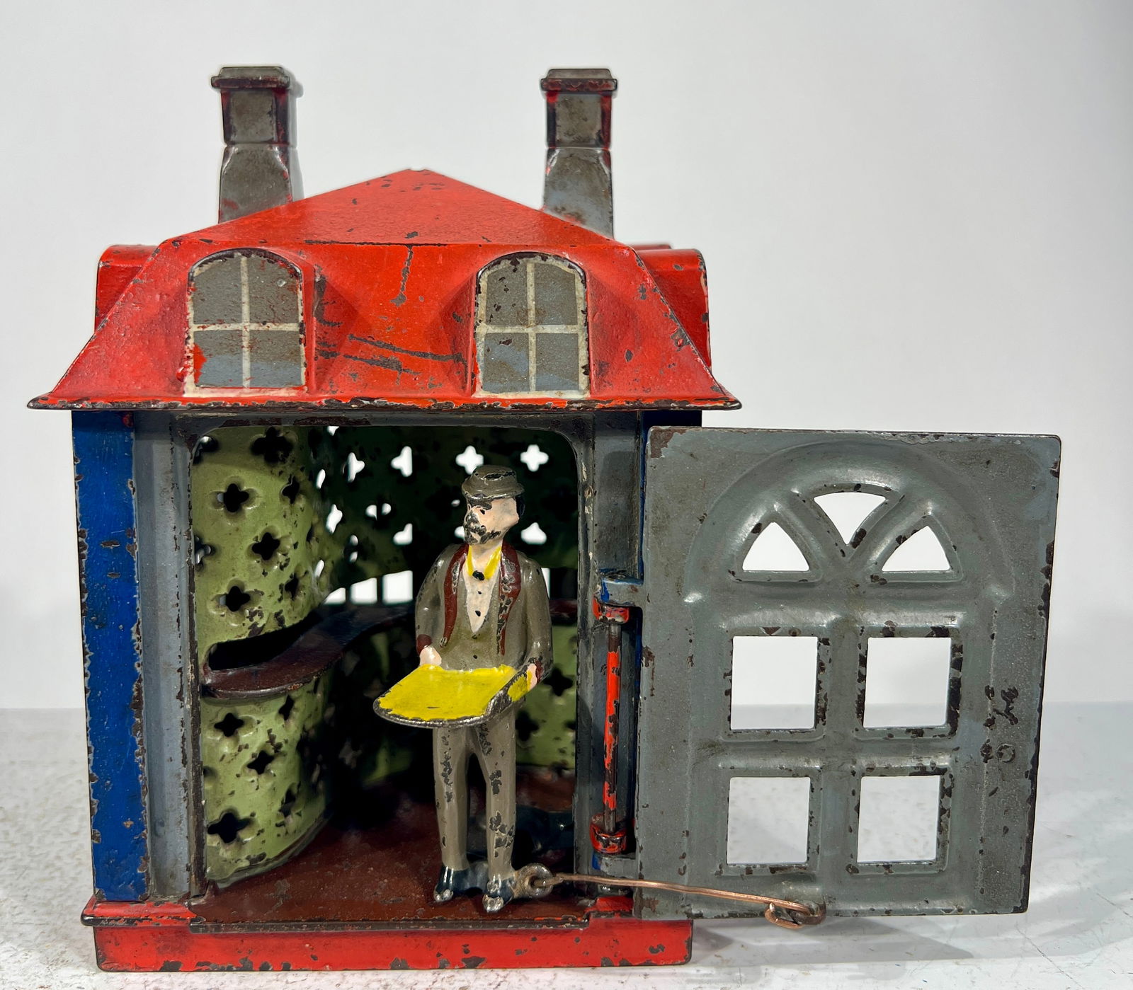 Novelty Bank- Grey, Red Blue: J. + E Stevens Company Cromwell, CT- 1870's 6 1/4"T x 4 1/4" W x 4 1/4"D The Olshefski Collection