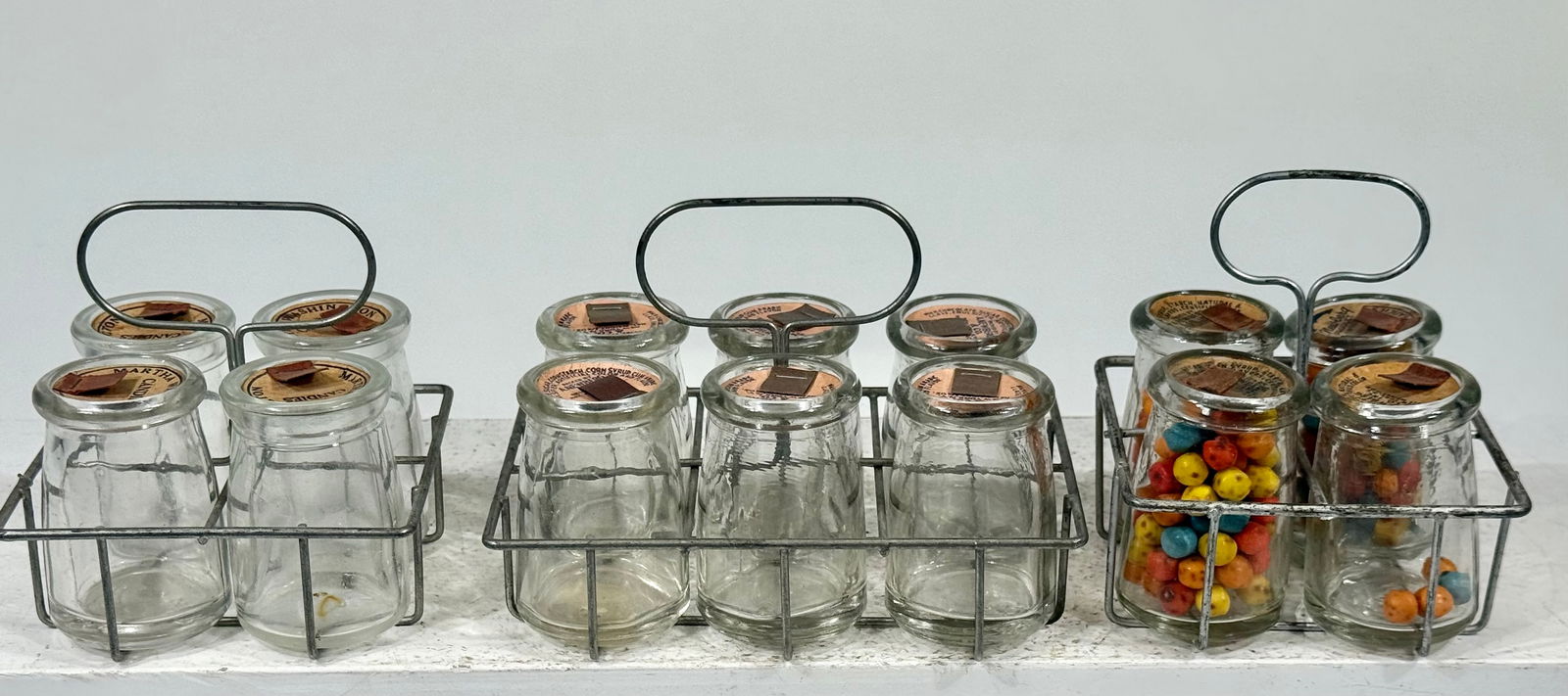 Three Candy Container Milk Bottles in wire Baskets (1 of 3)