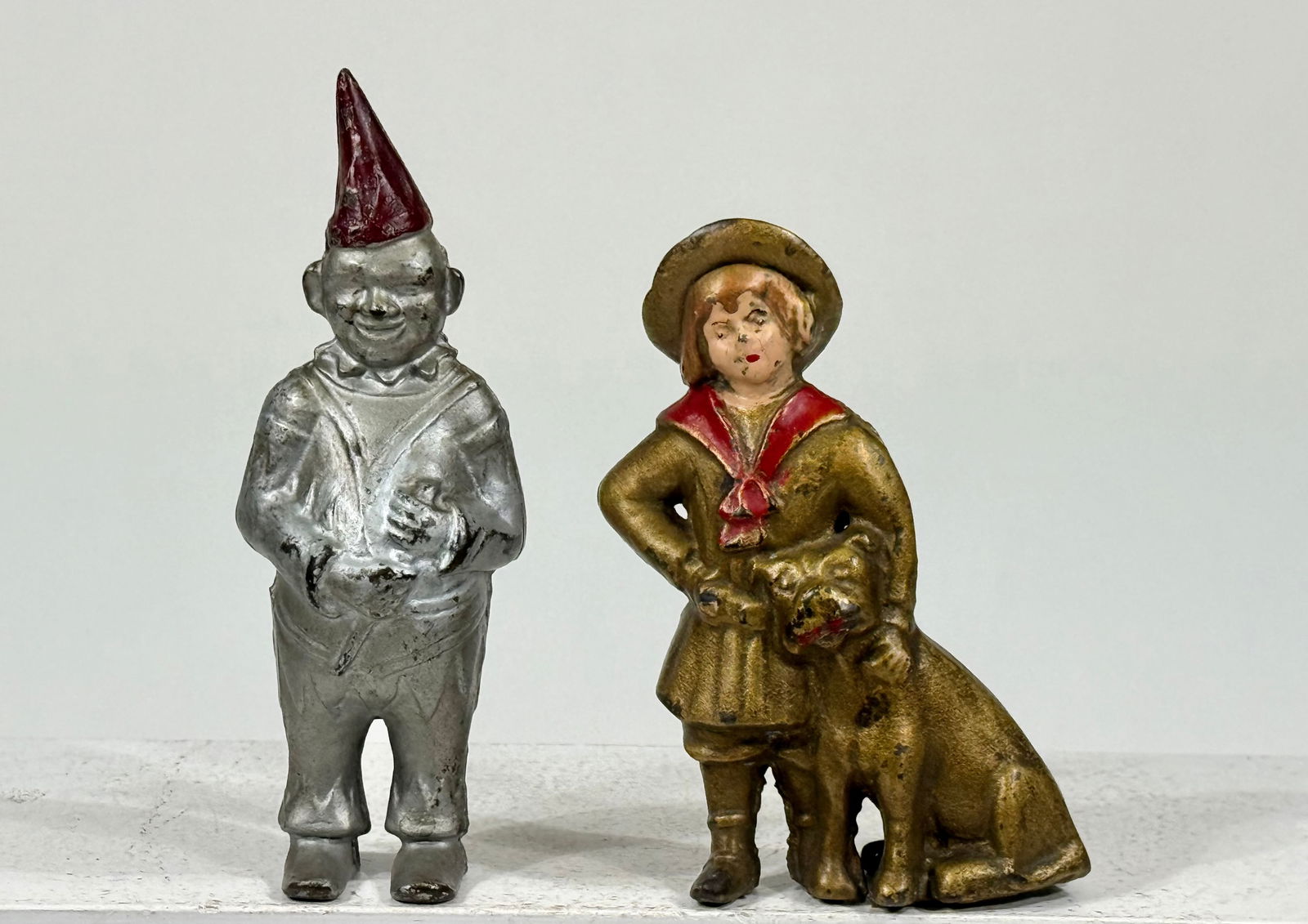 Clown / Mutt + Jeff Banks: A.C, Williams CoRavenna, OH- 1920 Clown is- 6 1/2"T x 2 1/4"W x 1 1/4"DThe Peirce Collection