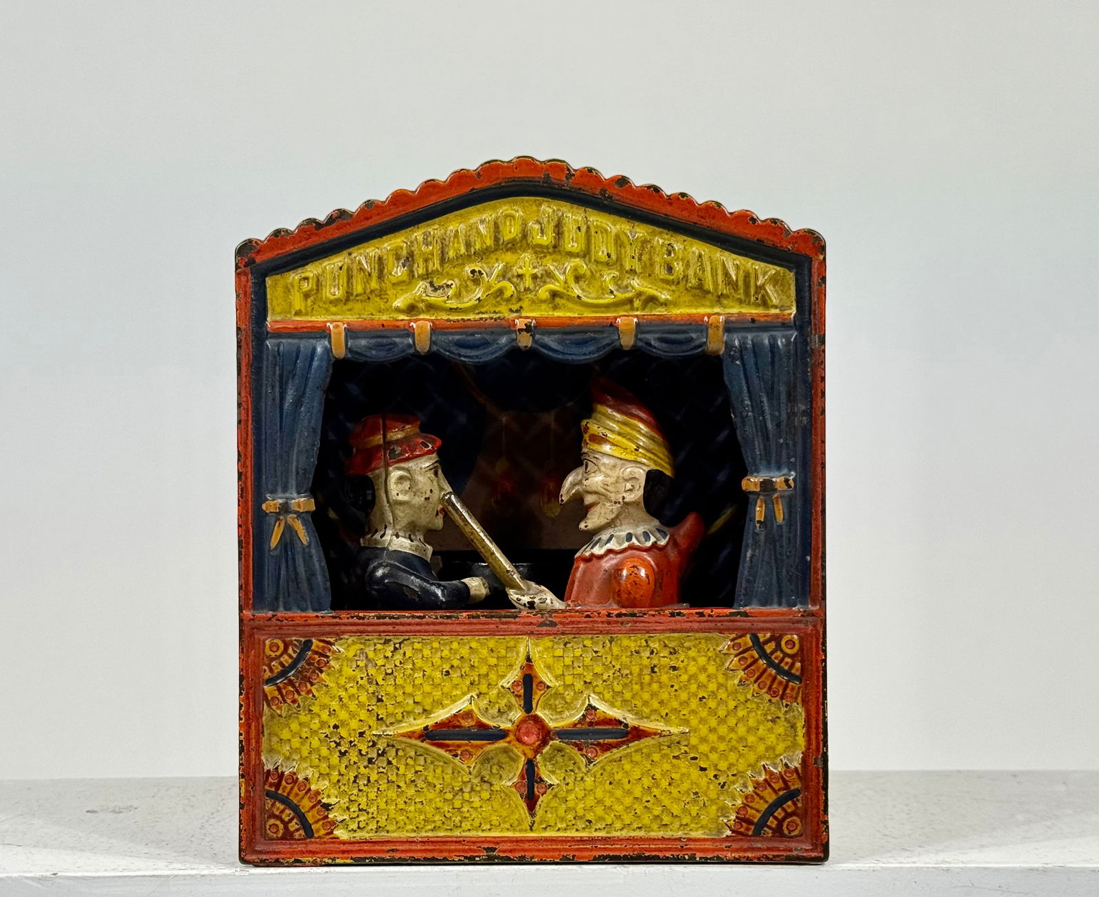 Punch + Judy Bank- Large Letters: Shepard Hardware Company Buffalo, NY- 18847 1/4"T x 6 ?"W x 4"D The Pierce Collection