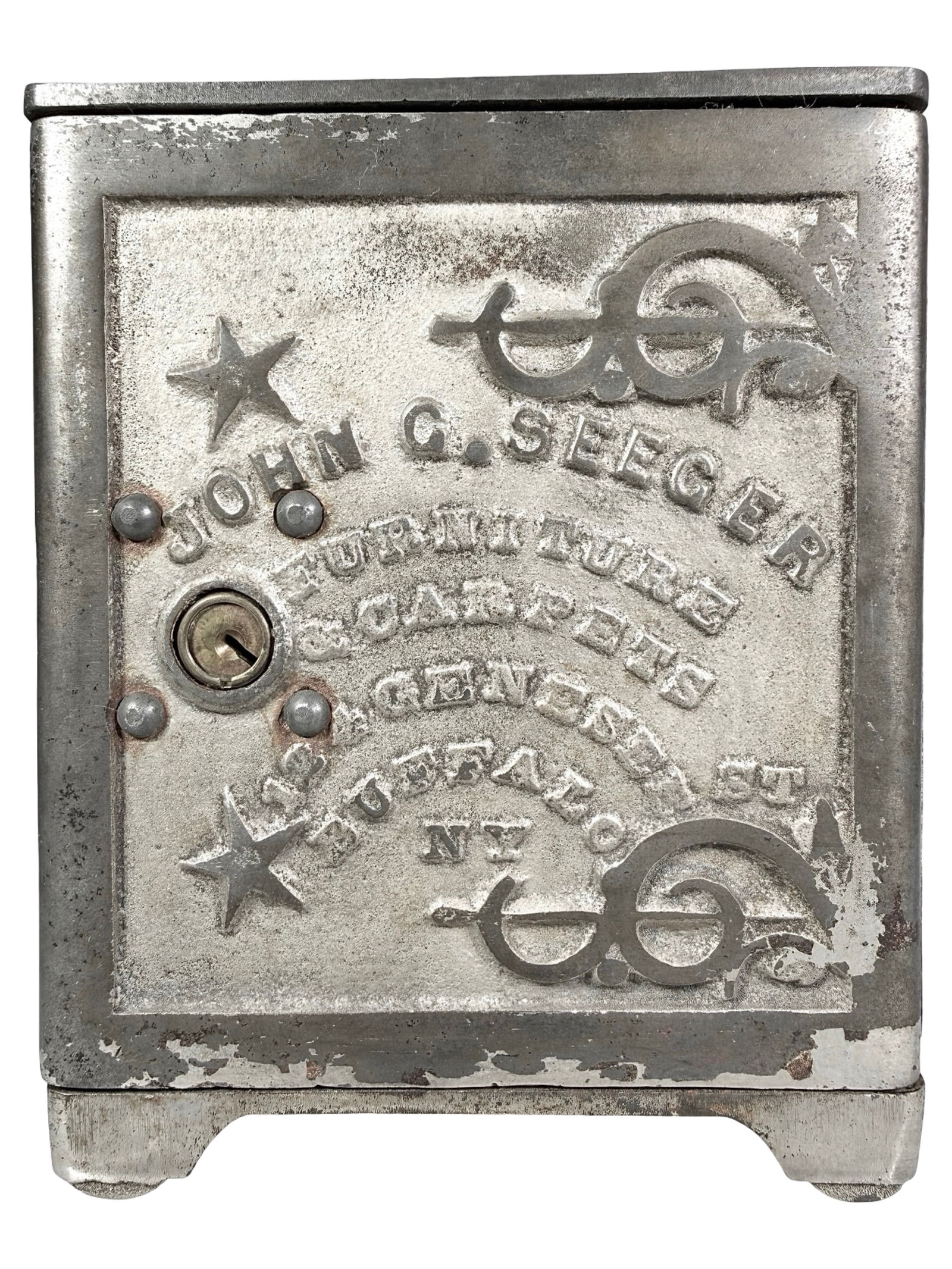 John G. Seegar Furniture & Carpets Safe: Made by W. Rouse & Co. Troy, NY - 1895. 6 1/4" Tall x 5" Wide x 4 1/2" Deep. The Peirce Collection.