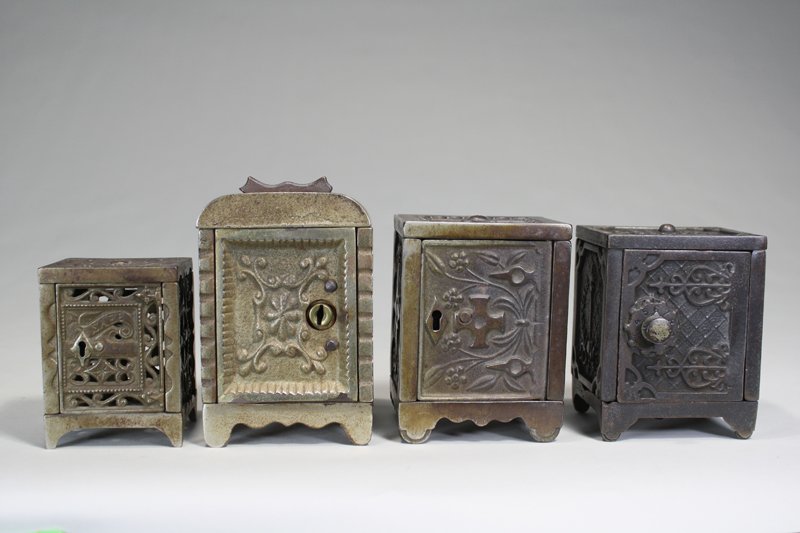 Lot: Four Safe Banks: J. & E. Stevens / Kenton Hardware American – Circa 1895 They vary in size from 3 ½” – 4 ½” tall. Material: Cast Iron