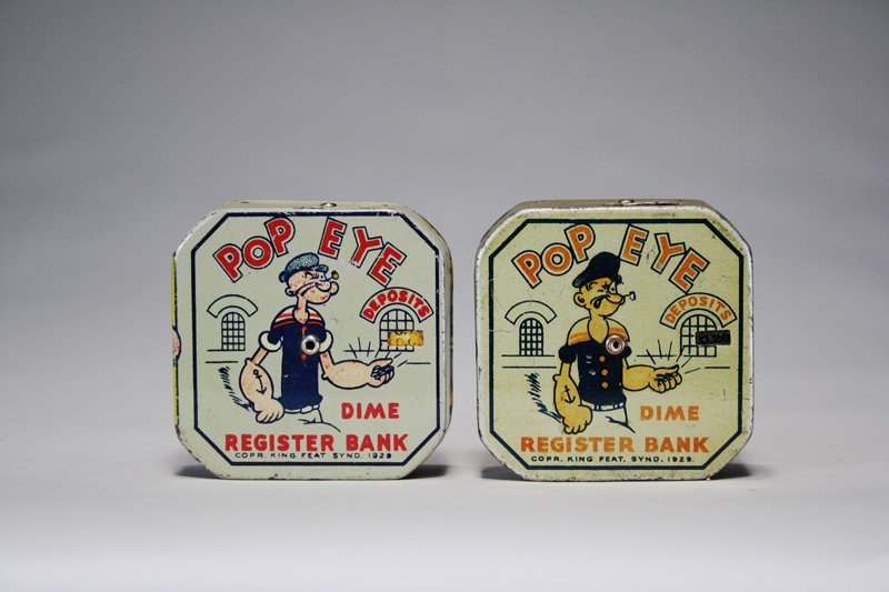 Lot: Two Popeye Pocket Dime Registers: American – Circa 1935 Material: Tin