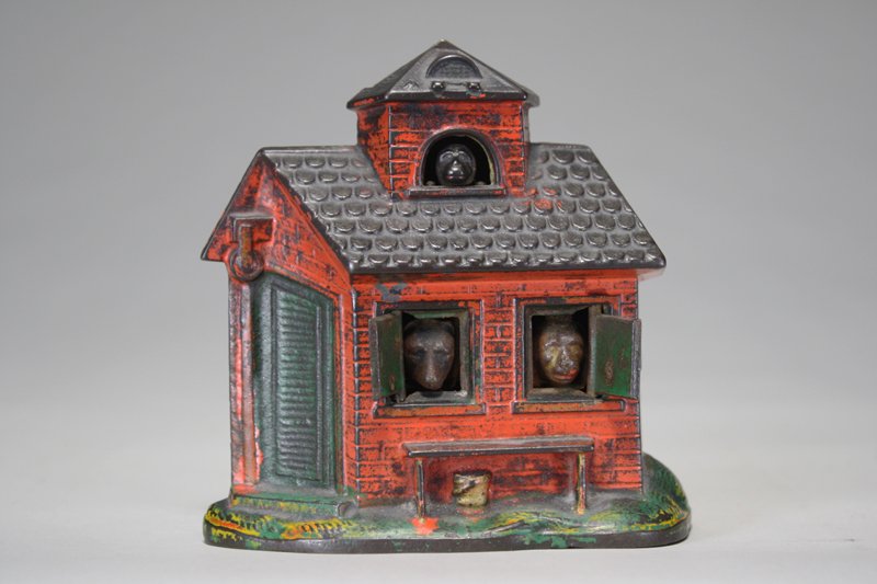 Zoo Bank Mechanical Bank: Made by Kyser & Rex Company Philadelphia, Pennsylvania – Circa 1880 Without a doubt, the Zoo Bank is the smallest and cutest bank ever produced. Place a coin in the roof dormer and press the monkey�