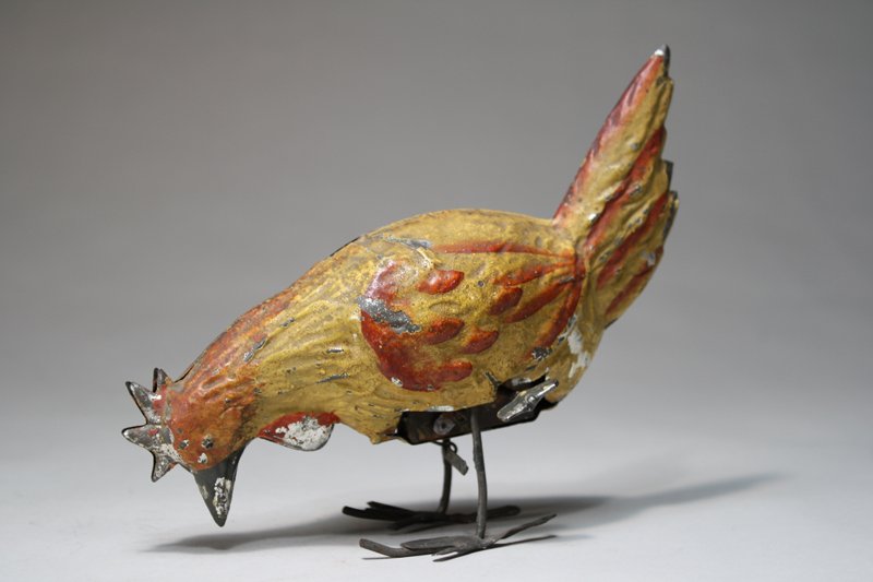 Pecking Rooster Gunthermann: Guntermann Germany – Circa 1910 This hand painted toy is 7” long and works well. Material: Tin