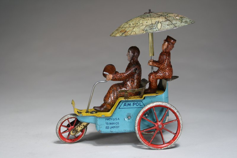 Ampol: E. P. Lehmann Germany – Circa 1905 A scarce E. P. Lehmann toy depicting Admiral Perry returning from his trip to the North Pole. The toy works well. Material: Tin
