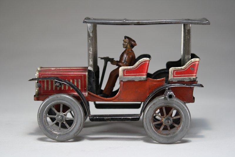Gyroscopic Touring Car: George Carette • Germany – Circa 1908 This little charmer is 5” long and works well. Material: Tin
