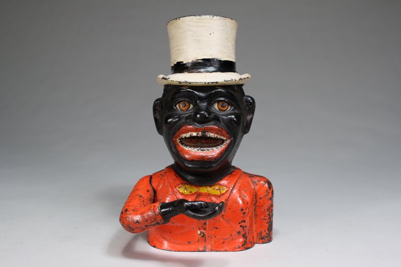 Jolly N. - White High Hat Mechanical Bank: John Harper Ltd. Willenhall, England – Circa 1915 This is a classic coin-swallowing English bank. Material: Cast Iron Provenance: John Haley