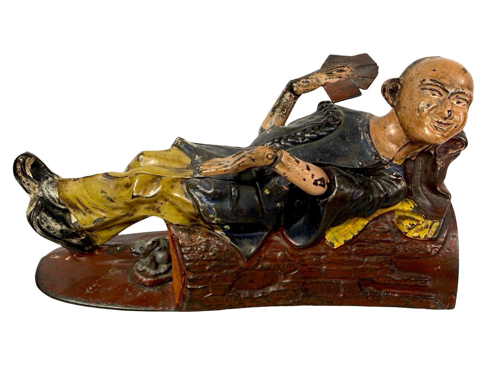 Reclining Chinaman - Cast Iron Mechanical Bank: This is a fairly scarce bank. J. & E. Stevens Company - Cromwell, CT. 1880's. 4 1/4" Tall x 8 1/4" Long x 2 1/2" Deep. The Peirce Collection.