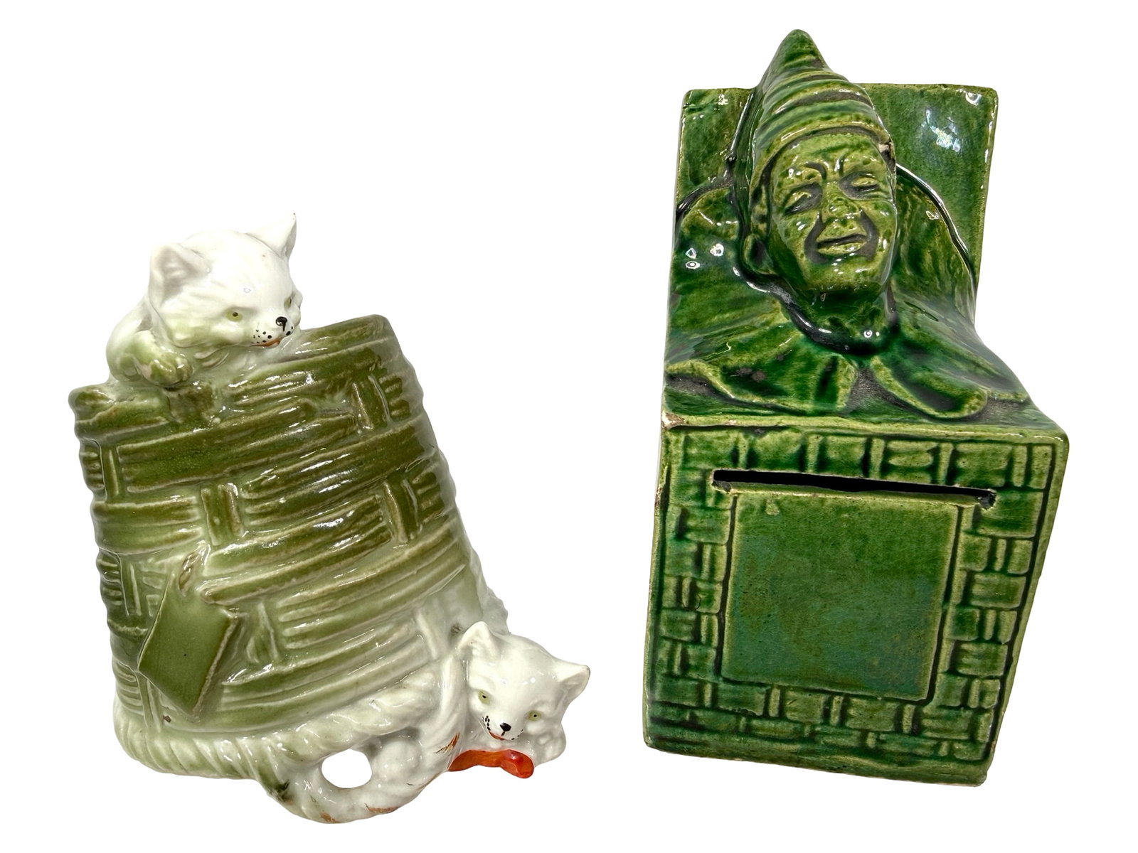 Two Porcelain Banks: Austrian 1910's. Taller is 4 5/8" Tall x 2" Wide x 2" Deep. The Peirce Collection.