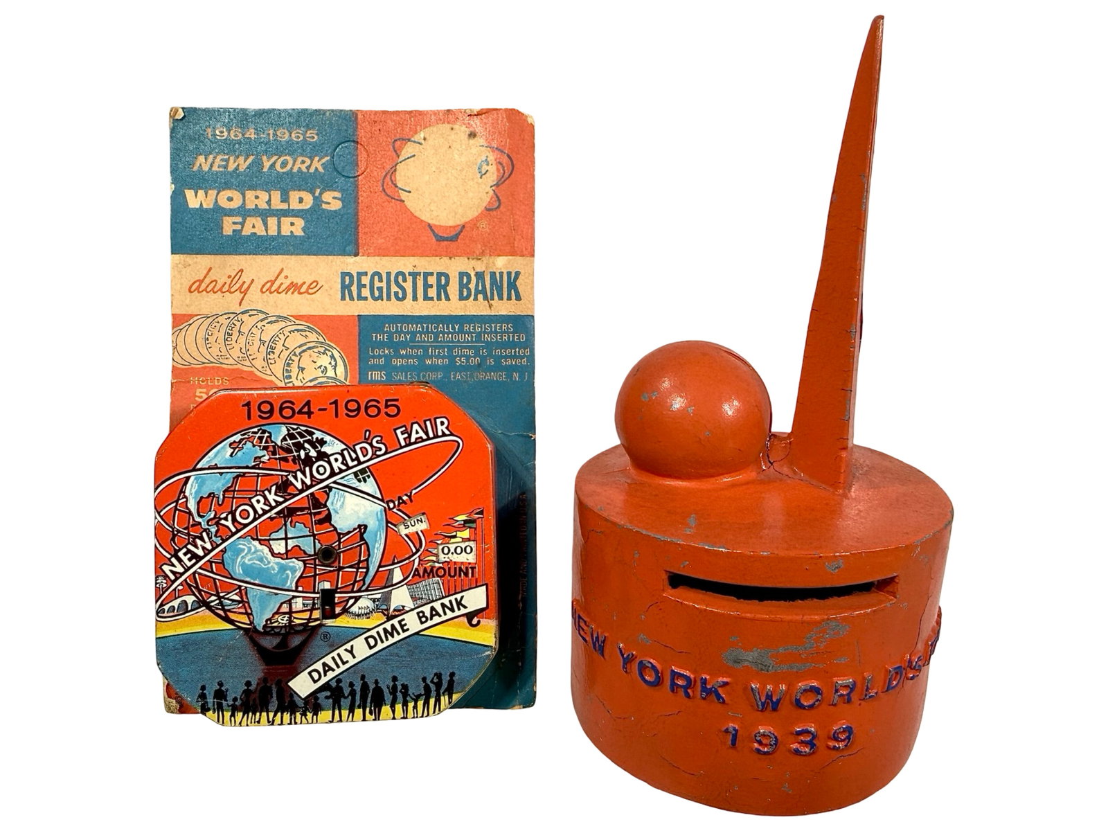 1939 World's Fair Bank and 1964-1965 Pocket Dime Register: American 1939 / 1964. Taller is 5 1/2" Tall x 3" Circular. The Peirce Collection.